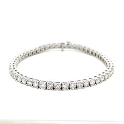 7' Tennis bracelet in platinum with 4-prong basket set (50) round diamonds.  D9.87ct.t.w.