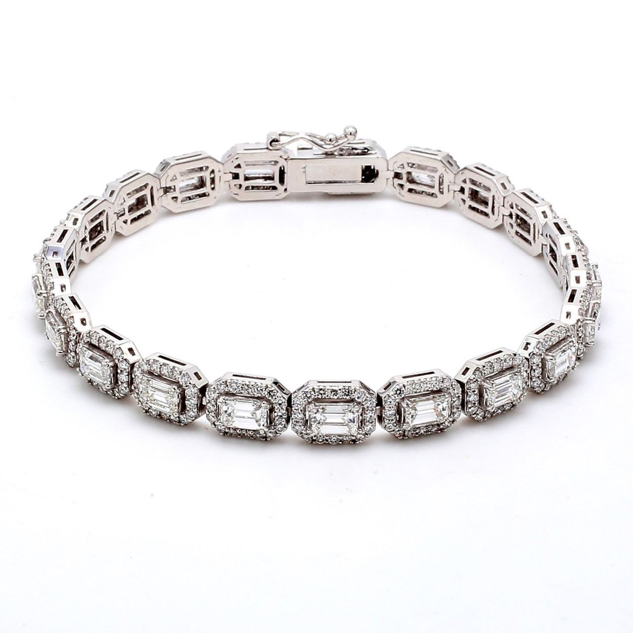 7.5' Halo tennis bracelet with prong set rounds around prong set emerald cut diamonds.  D8.30ct.t.w.