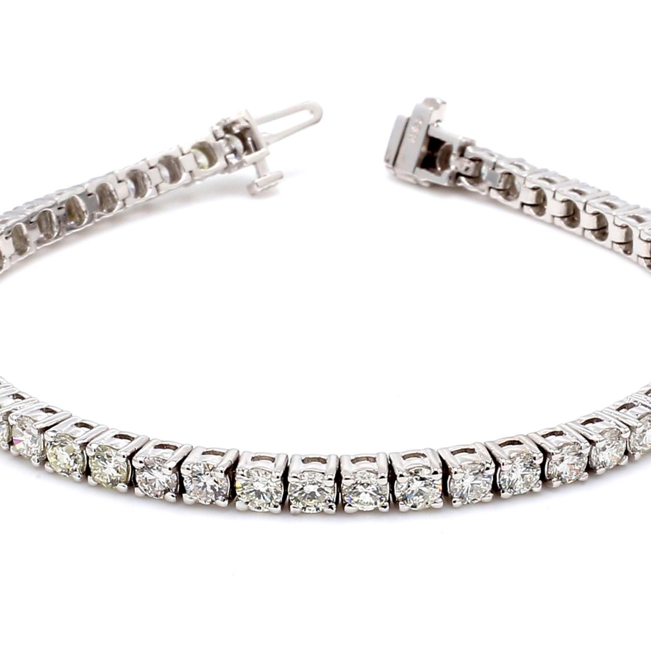 7' Tennis bracelet with 4-prong set (77) round diamonds.  D3.07ct.t.w.