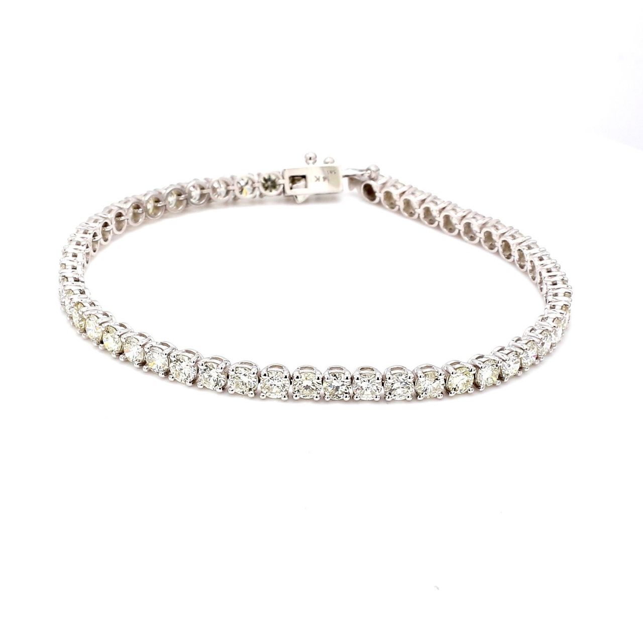 7' Tennis bracelet with 4-prong set (51) round diamonds.  D7.54ct.t.w.