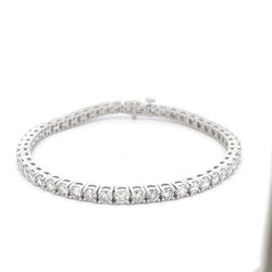 7' Tennis bracelet with 4-prong basket  set (55) round diamonds.  D4.96ct.t.w.