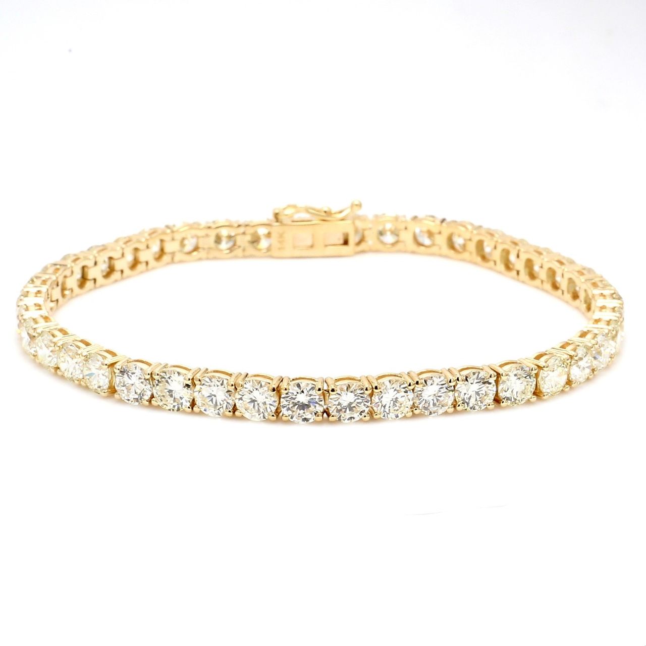 7' Tennis bracelet in 14K YG with basket 4-prong set (46) round diamonds.  D7.87ct.t.w.