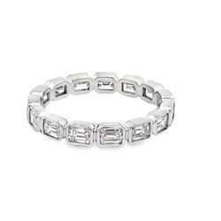 Eternity band east west style in 18K WG with bezel set (15) emerald diamonds.  D1.71ct.t.w.  Size 6