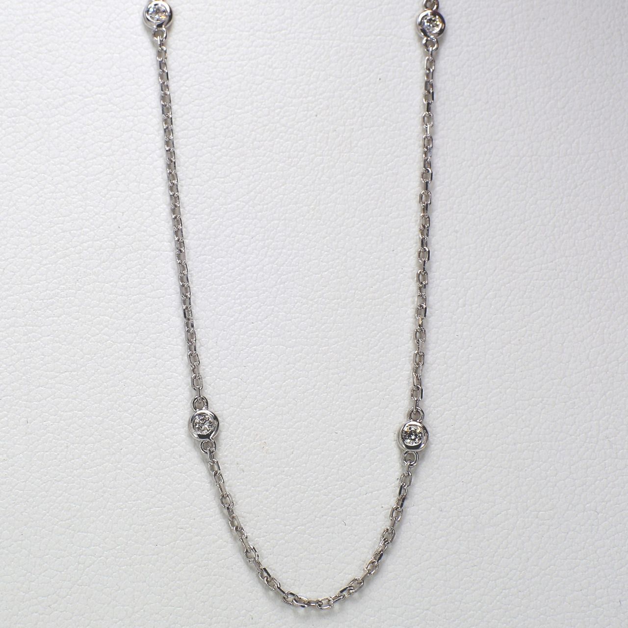 18' Diamonds by the yard necklace with bezel set (10) round diamonds.  D0.45ct.t.w.