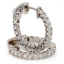 0.75' Inside out hoop earrings with shared prong set (38) round diamonds & with special spring lock.  D0.85ct.t.w.