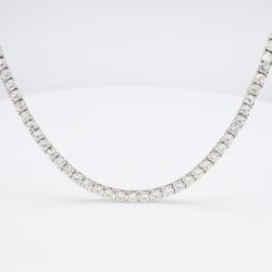 18' Tennis necklace with basket prong set (123) round diamonds.  D22.88ct.t.w.