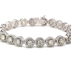 7' Halo tennis bracelet with prong set (22) round diamonds.  D8.15ct.t.w.