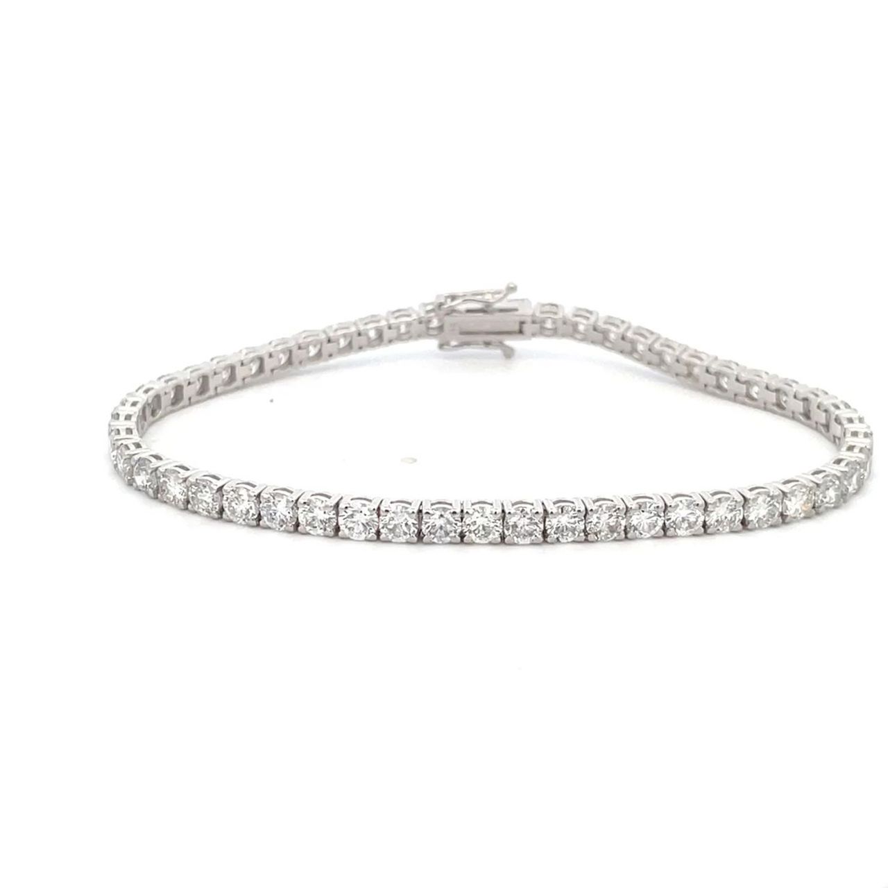 7' Tennis bracelet with open basket 4-prong set (51) round diamonds.  D7.63ct.t.w.