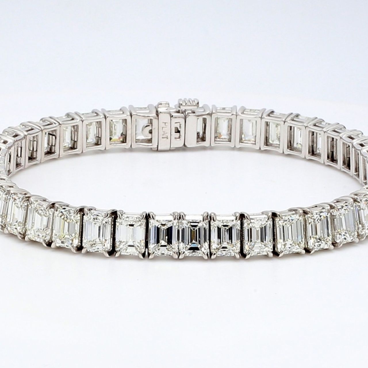 7' Tennis bracelet with 4-prong set (50) emerald cut diamonds.  D15.55ct.t.w.