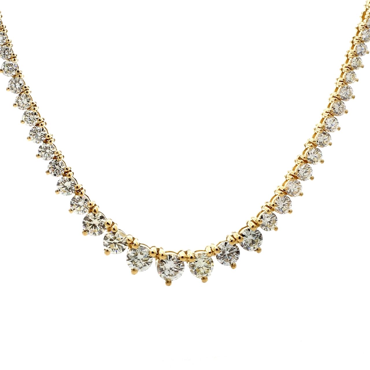 18' Graduating tennis necklace in 18K YG with 3-prong set (193) round diamonds.  D4.81ct.t.w.