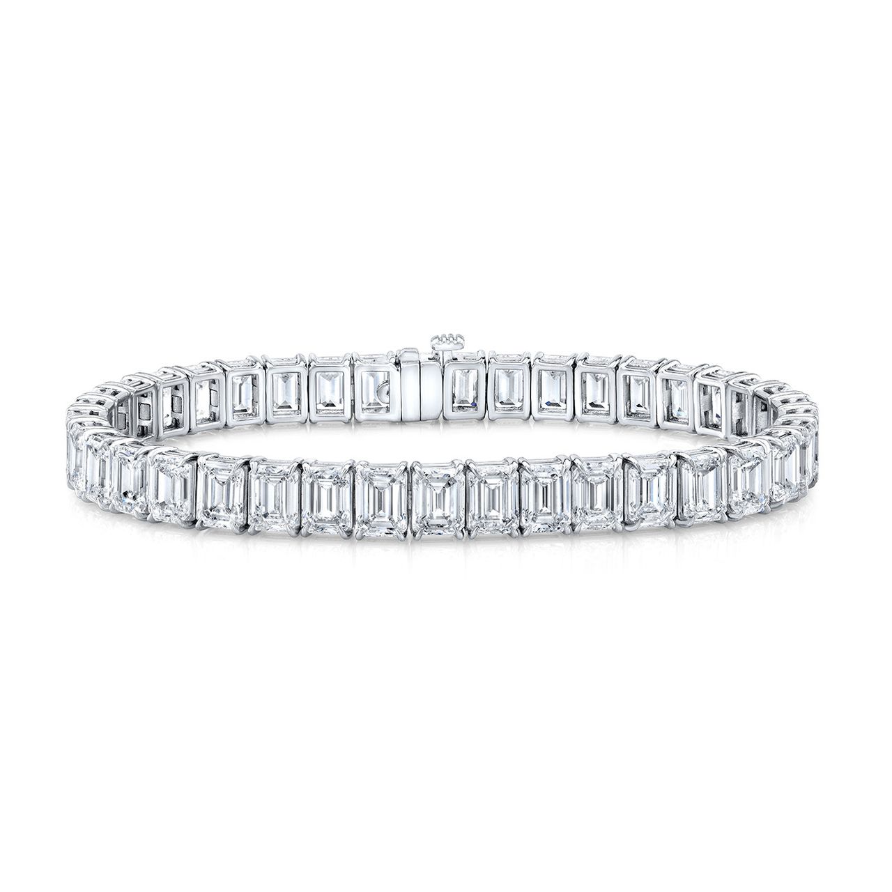7' Tennis bracelet in platinum with 4-prong basket set (59) emerald cut diamonds.  D11.15ct.t.w.
