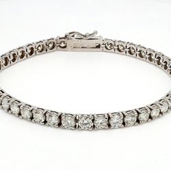 7' Tennis bracelet with 4-prong claw set (36) round diamonds.  D14.56ct.t.w.