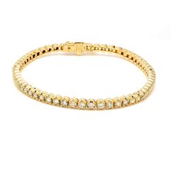 7' Tennis bracelet in 14K YG with crown head set (60) round diamonds.  D2.98ct.t.w.