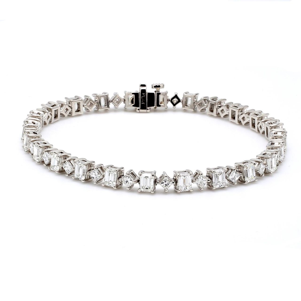 7' Tennis bracelet in platinum with 4-prong set alternating emerald and princess cut diamonds.  D7.63ct.t.w.
