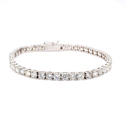 7' Tennis bracelet in 18K WG with 4-prong set (42) round diamonds.  D11.52ct.t.w.