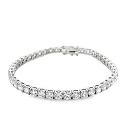 7' Tennis bracelet with 4-prong set F/VS (45) round diamonds. D10.67ct.t.w.