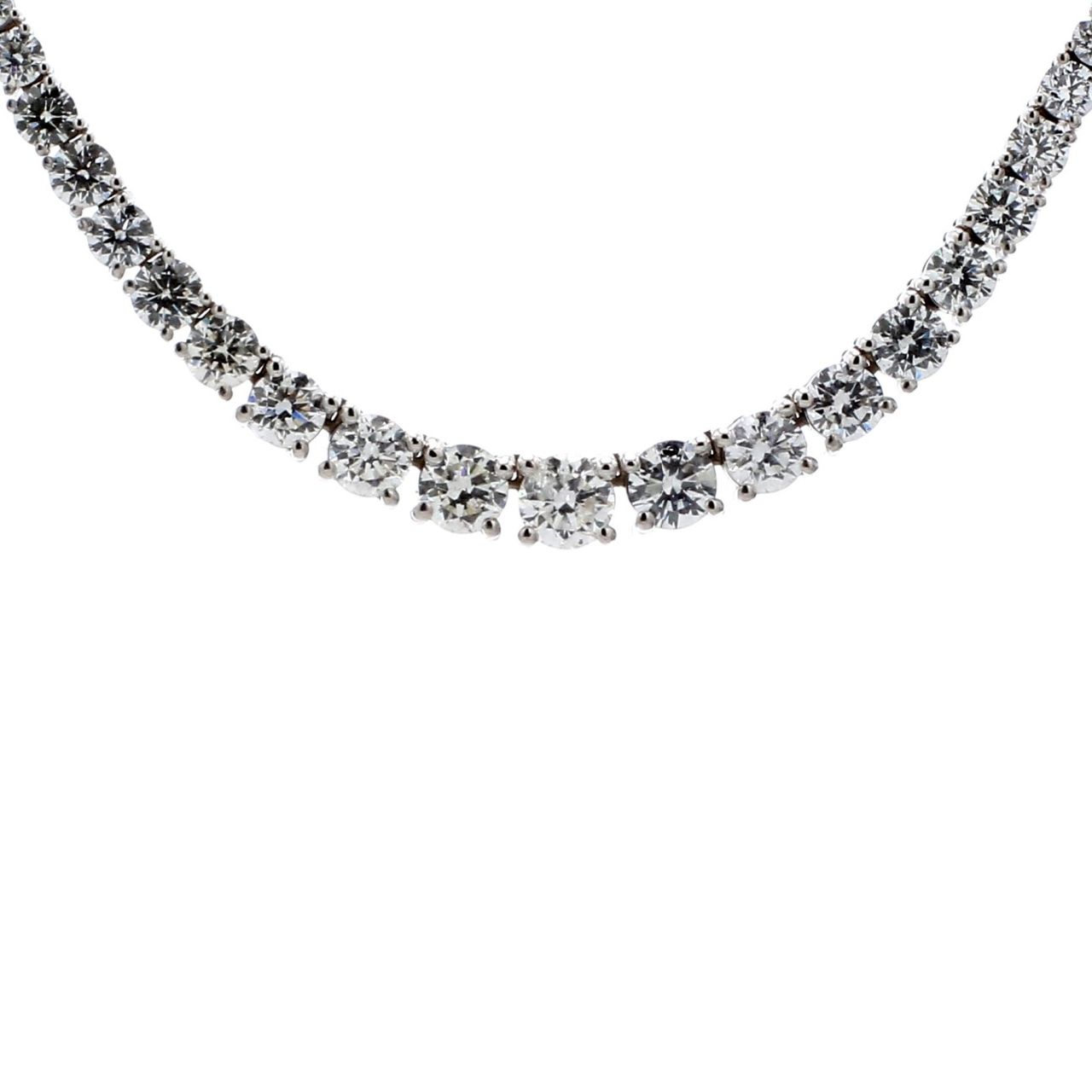 16' Graduated half-way tennis necklace in white gold w/ 4-prong set (83) round diamonds. D6.06ct.t.w.
