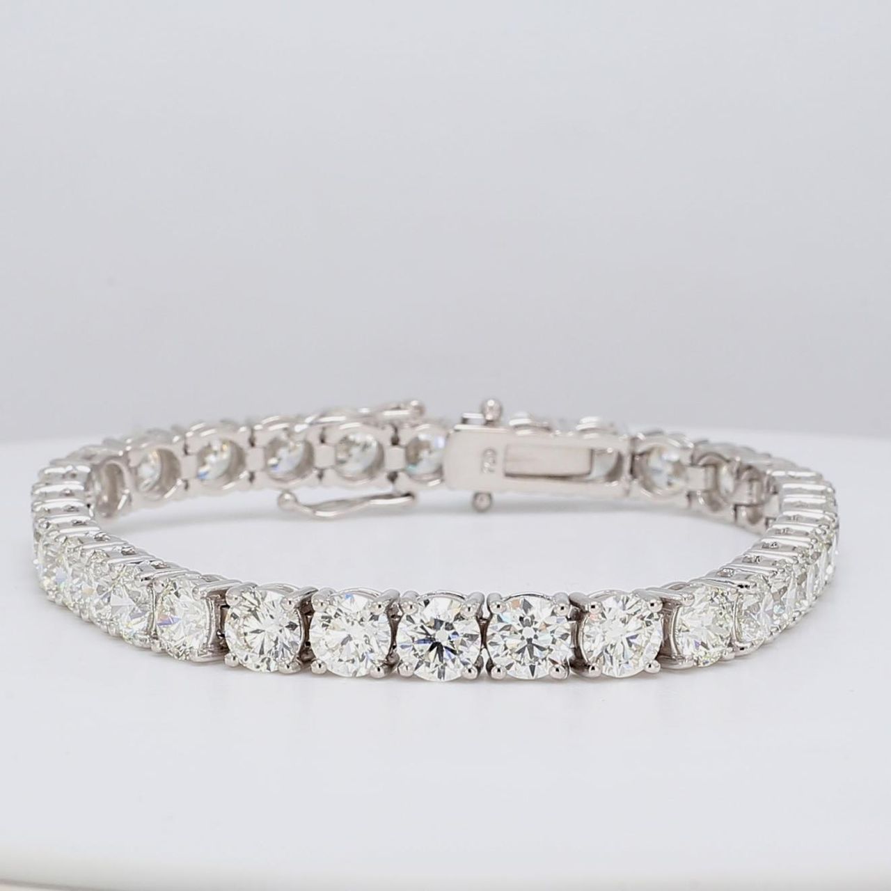 7' Tennis bracelet with 4-prong set (51) round diamonds.  D6.67ct.t.w.