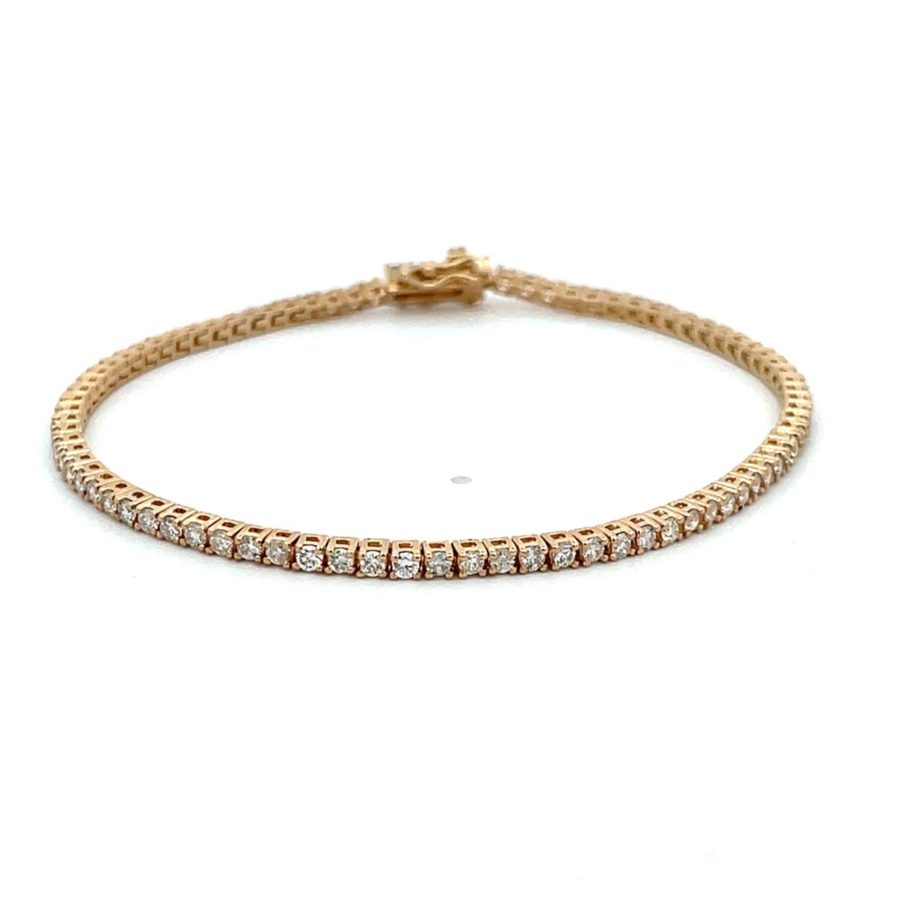 7' Tennis bracelet in yellow gold with 4-prong basket set (80) round diamonds.  D2.19ct.t.w.