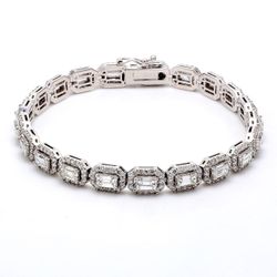 7' Halo tennis bracelet with pave set rounds and 4-prong set (23) emerald cut diamonds.  D7.42ct.t.w.
