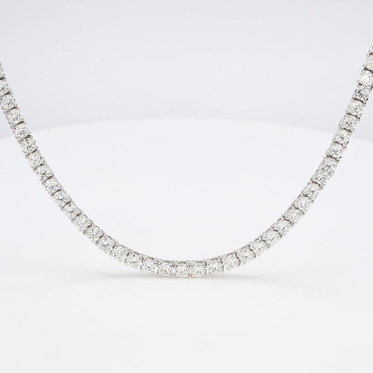 20' Tennis necklace in 18K WG with 4-prong basket set (166) round diamonds.  D13.64ct.t.w.
