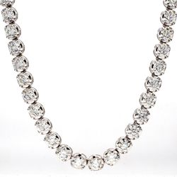 20' Tennis necklace with 4-prong crown head set (121) round diamonds.  D10.70ct.t.w.