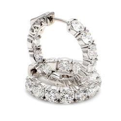 0.75' Inside out hoop earrings with 4-prong set (20) round diamonds & with special spring lock.  D5.31ct.t.w.