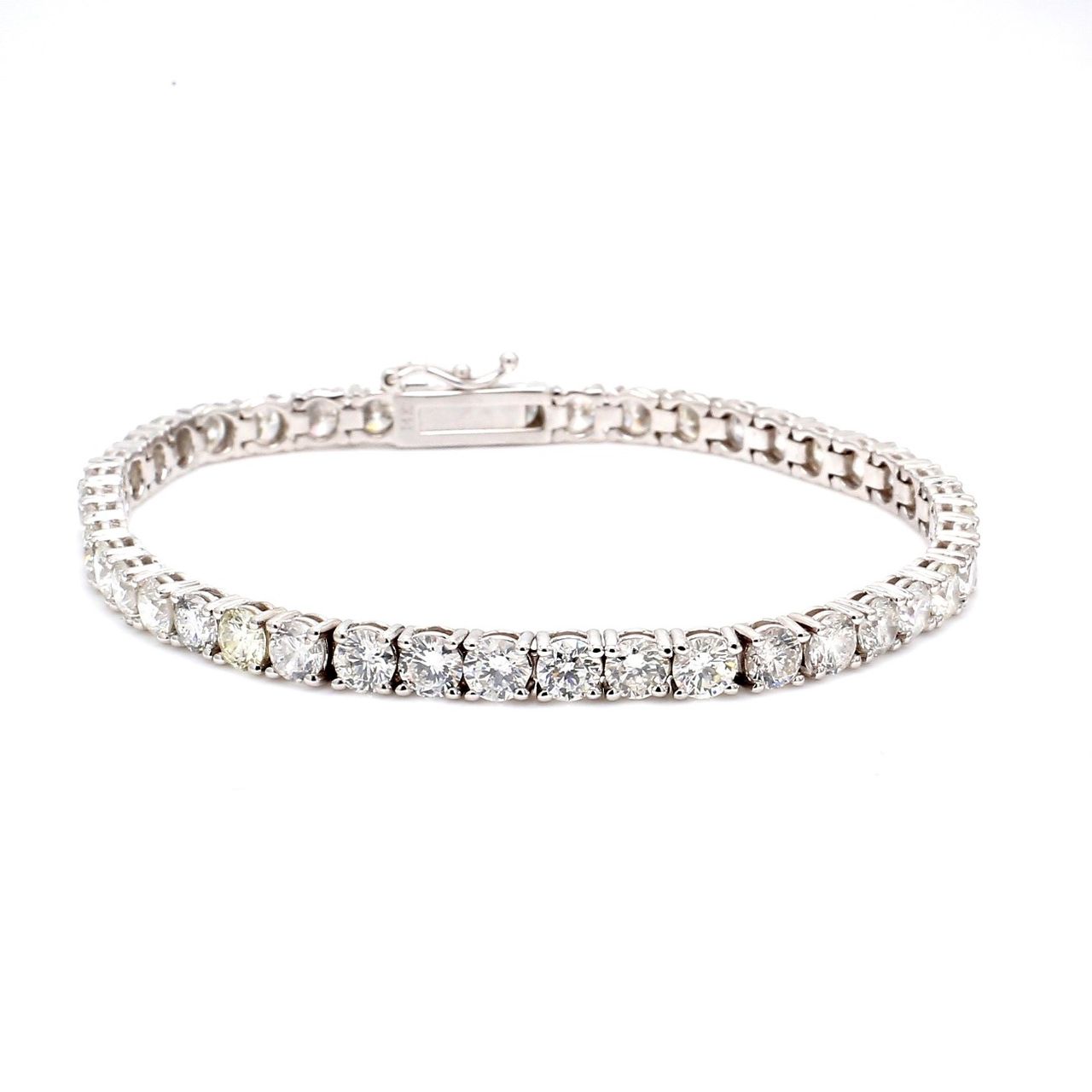 7' Tennis bracelet in 18K WG with 4-prong set (44) round diamonds.  D9.91ct.t.w.