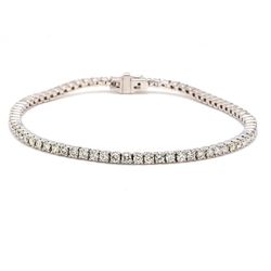 7' Tennis bracelet with crown set (76) round diamonds.  D2.92ct.t.w.