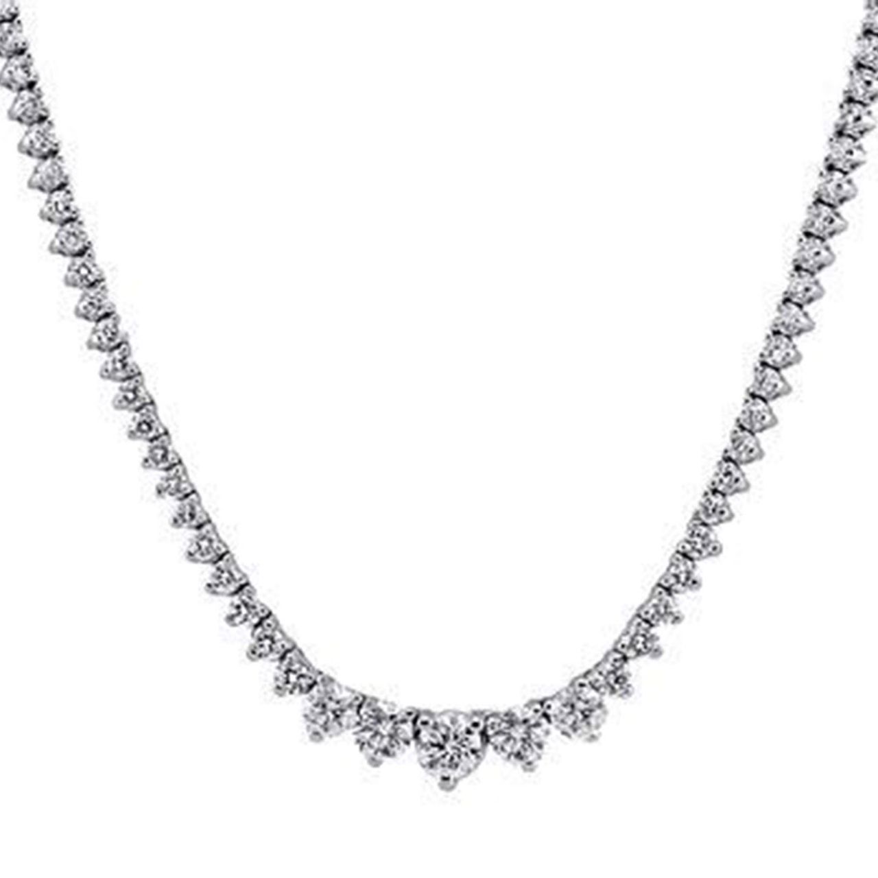17.5' Graduated tennis necklace in 18K WG with 3-prong set round diamonds.  D15.81ct.t.w.  (Center 1.00ct.)