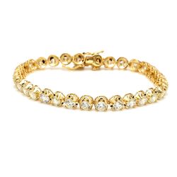 7.5' Tennis bracelet in 14K YG with crown head prong set (32) round diamonds.  D9.68ct.t.w.