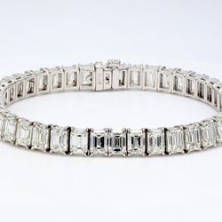 7' Tennis bracelet with 4-prong set (50) emerald cut diamonds.  D15.55ct.t.w.