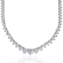 18' Graduating tennis necklace in 18K WG with 3-prong set round diamonds.  D7.11ct.t.w.  (Center - 0.37ct.)