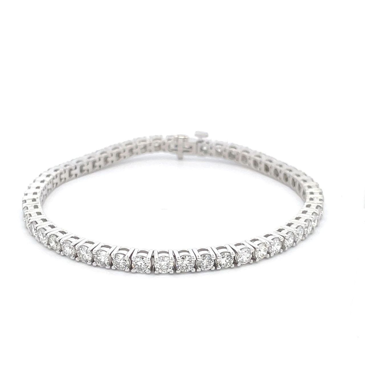 7' Tennis bracelet with basket prong set (78) round diamonds.  D2.82ct.t.w.