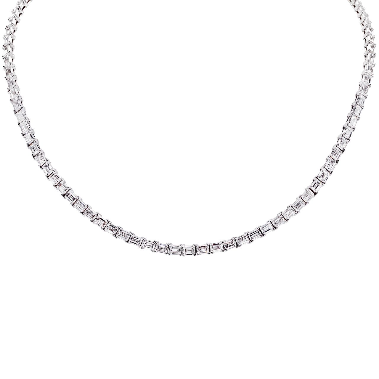 17' Tennis necklace east to west style in 18K WG with basket prong set (95) emerald cut diamonds.  D28.11ct.t.w.