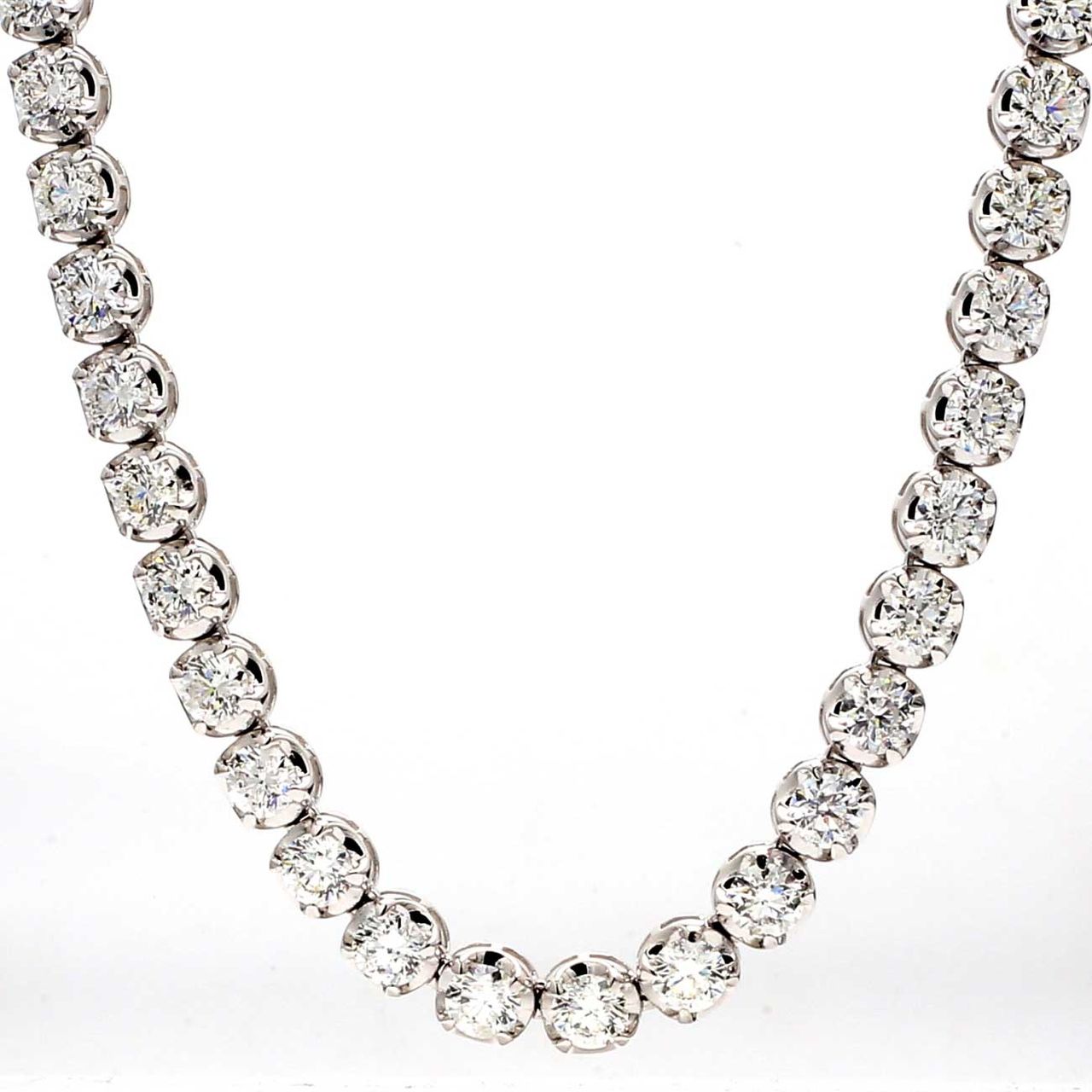 17' Tennis necklace in 18K WG with illusion crown head 4-prong set (74) round diamonds.  D22.60ct.t.w.