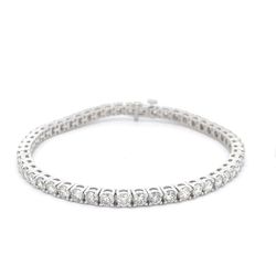 7' Tennis bracelet with basket prong set (68) round diamonds.  D3.17ct.t.w.