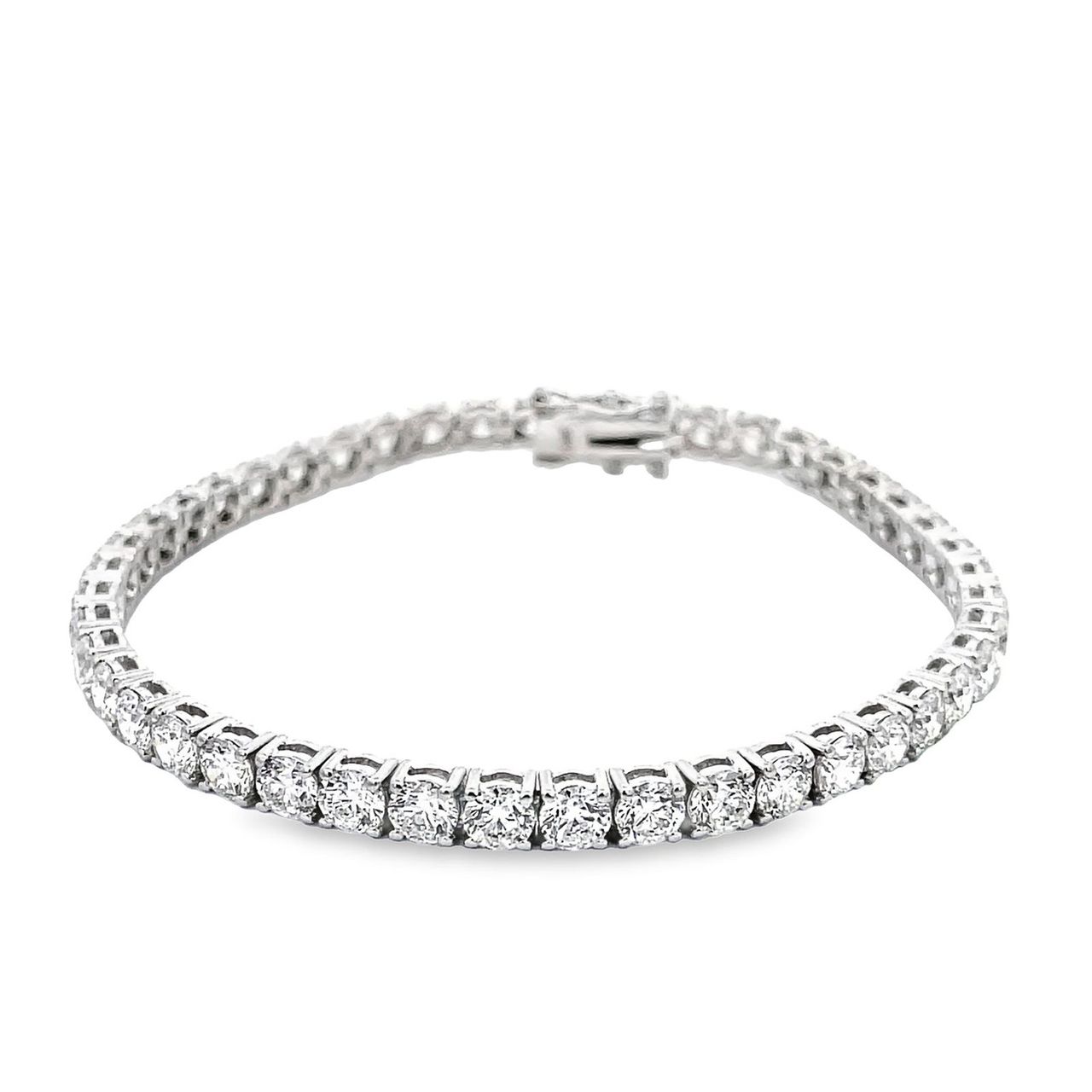 7' Tennis bracelet with 4-prong set F/VS (45) round diamonds. D10.67ct.t.w.