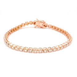 7' Tennis bracelet in 14K RG with crown head prong set (47) round diamonds.  D2.74ct.t.w.