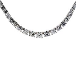 16' Graduated half-way tennis necklace in white gold w/ 4-prong set (83) round diamonds. D6.06ct.t.w.